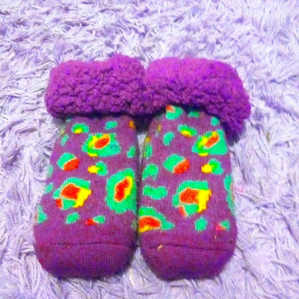 Purple woman's slipper socks for home.